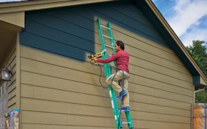 How to use a paint sprayer outdoors?